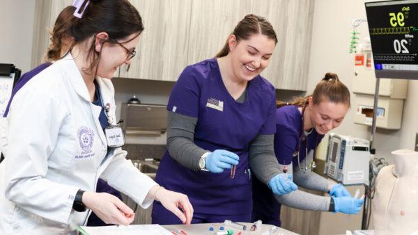 Nursing teacher giving instruction